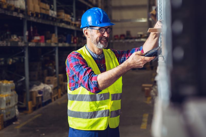 Warehouse worker scanning inventory