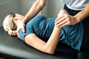 woman in physical rehabilitation after injury
