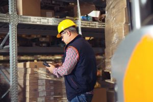 warehouse worker scanning a box